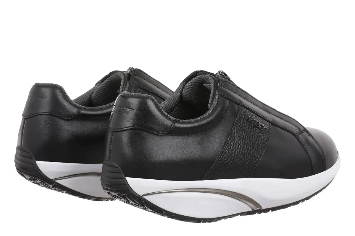 MBT AISAI Ledersneaker für Damen. Nappadesign mit Details aus Strukturiertem Leder. Frontaler Reißverschluss für leichten Einstieg.