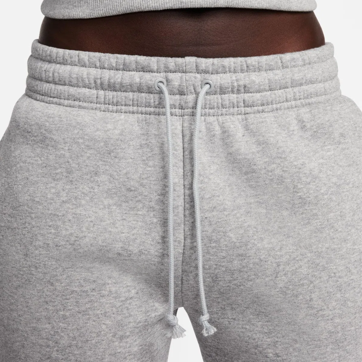 Nike Sportswear Phoenix Fleece Damen-Trainingshose mit mittelhohem Bund, FZ7626