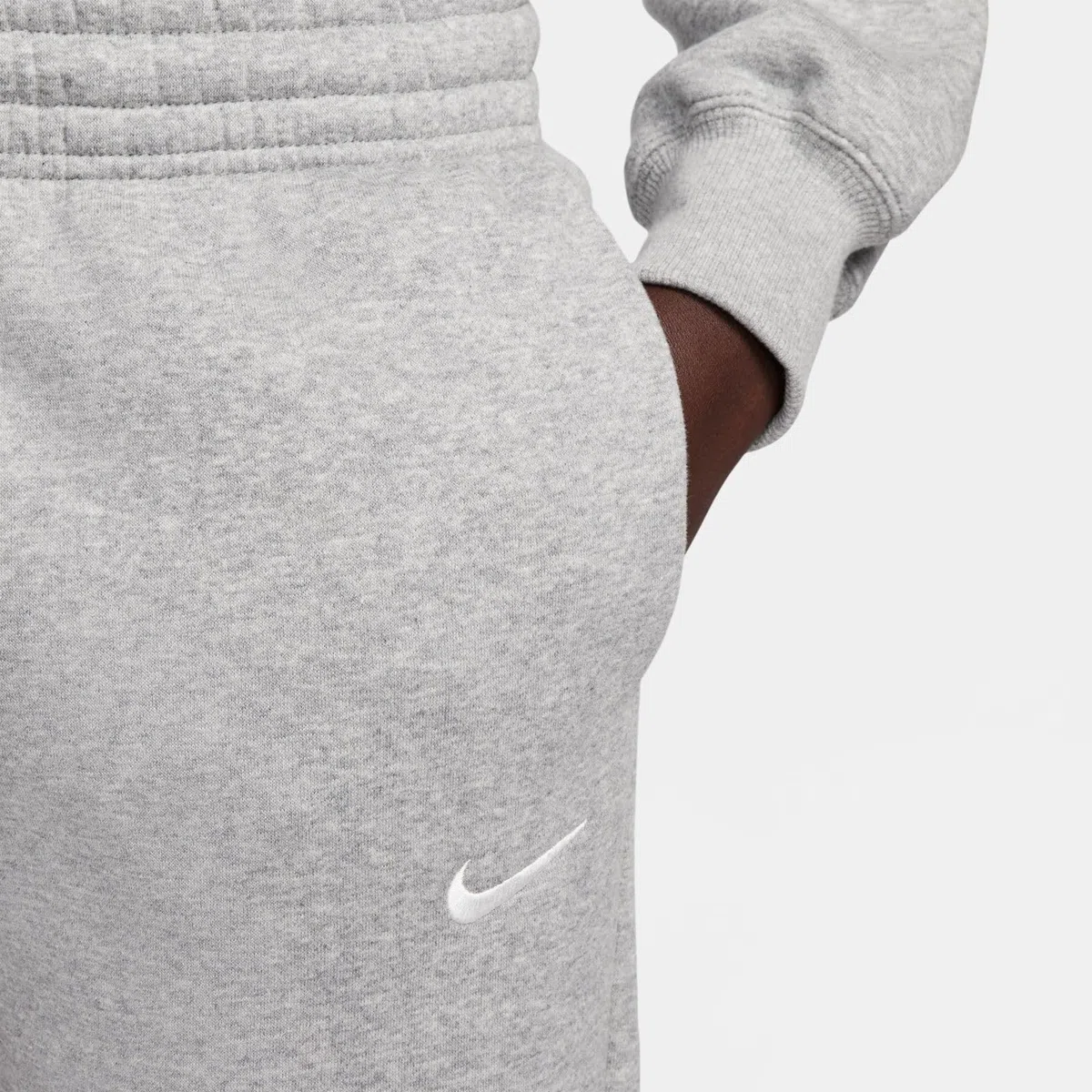 Nike Sportswear Phoenix Fleece Damen-Trainingshose mit mittelhohem Bund, FZ7626
