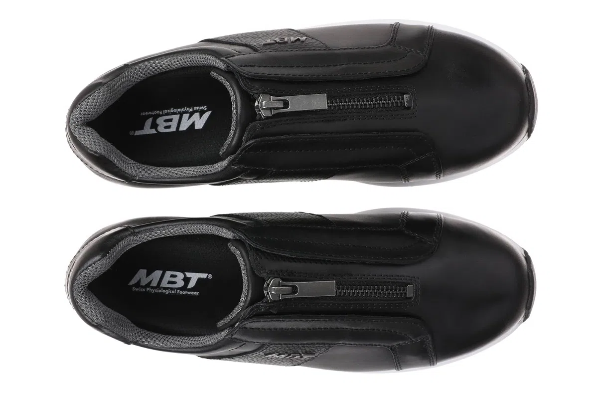 MBT AISAI Ledersneaker für Damen. Nappadesign mit Details aus Strukturiertem Leder. Frontaler Reißverschluss für leichten Einstieg.