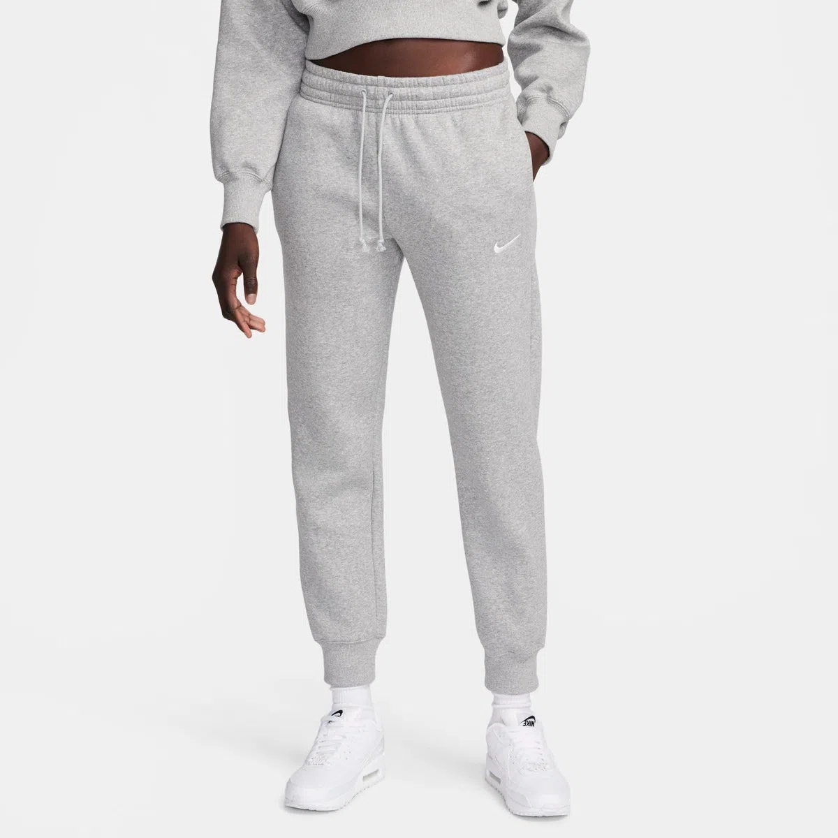 Nike Sportswear Phoenix Fleece Damen-Trainingshose mit mittelhohem Bund, FZ7626